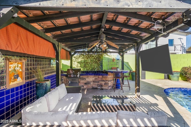 view of patio featuring grilling area, outdoor lounge area, and an outdoor bar