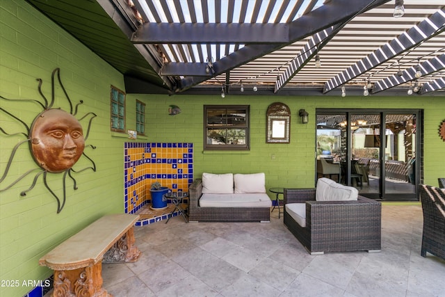 view of patio / terrace featuring an outdoor living space and a pergola