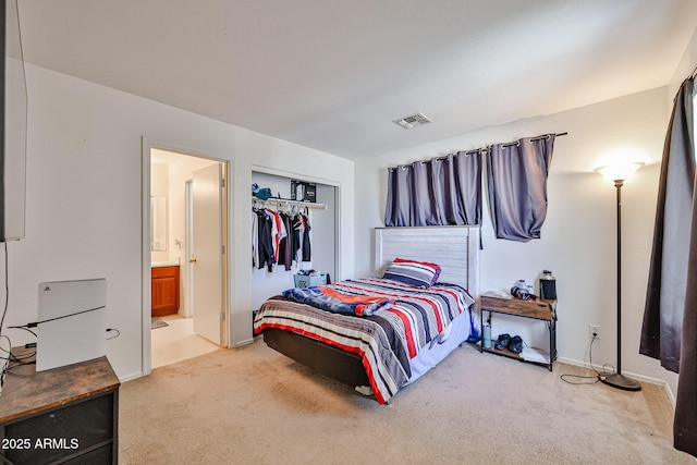 4318 W Apollo Rd, Laveen, AZ 85339 - bedroom featuring carpet floors, connected bathroom, and a closet