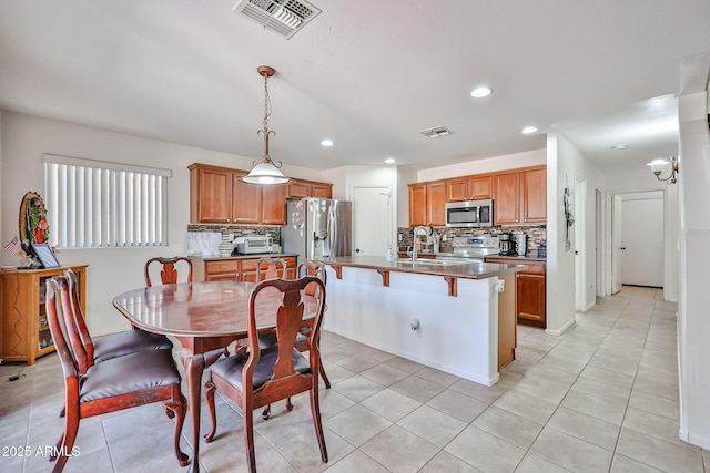4318 W Apollo Rd, Laveen, AZ 85339 - dining space featuring recessed lighting and light tile patterned flooring