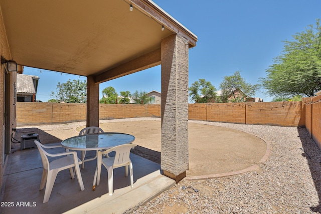4318 W Apollo Rd, Laveen, AZ 85339 - fenced backyard featuring a patio