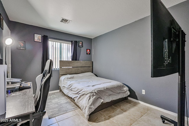 4318 W Apollo Rd, Laveen, AZ 85339 - bedroom with tile patterned flooring and baseboards