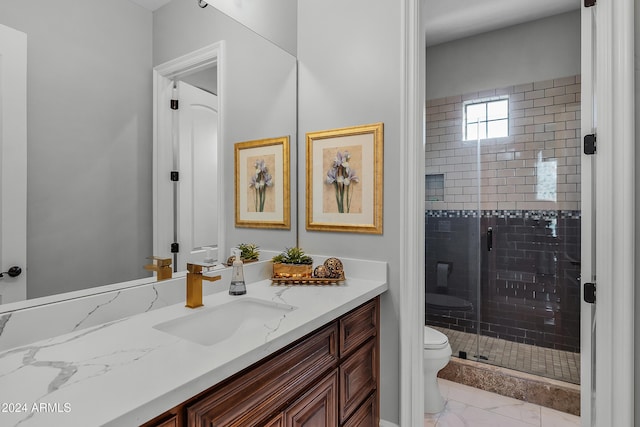 bathroom with walk in shower, vanity, and toilet