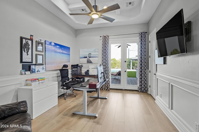 office area with french doors, light wood-type flooring, and ceiling fan