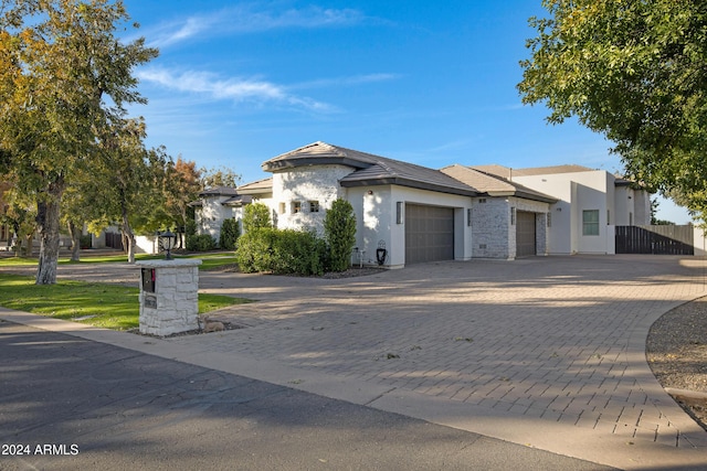 view of front of property featuring a garage