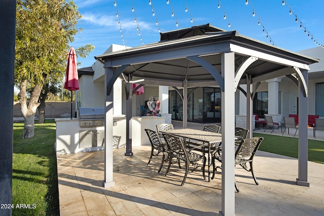 view of patio / terrace with a gazebo and area for grilling