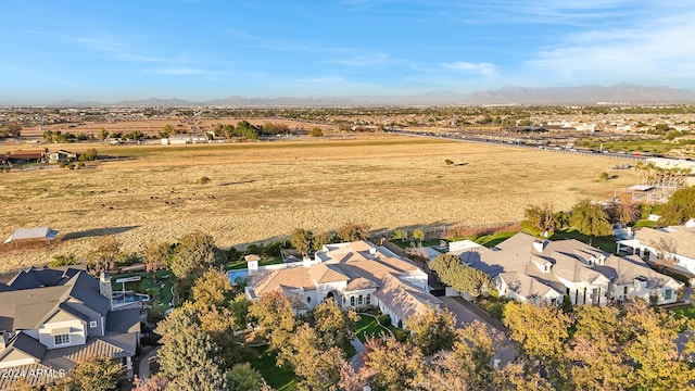 birds eye view of property featuring a mountain view