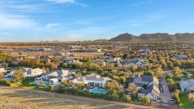 birds eye view of property featuring a mountain view