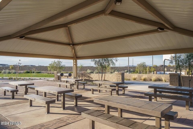 surrounding community with a gazebo and a patio