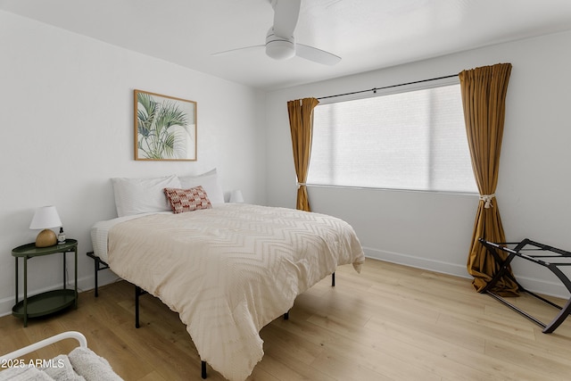 1111 E Turney Ave Unit 3, Phoenix, AZ 85014 - bedroom with light wood-type flooring, baseboards, and a ceiling fan