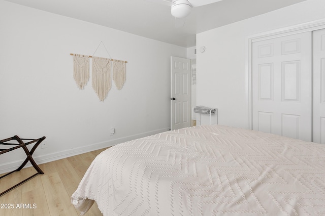 1111 E Turney Ave Unit 3, Phoenix, AZ 85014 - bedroom featuring light wood finished floors, baseboards, ceiling fan, and a closet