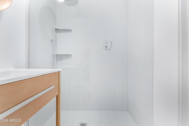 bathroom with tiled shower