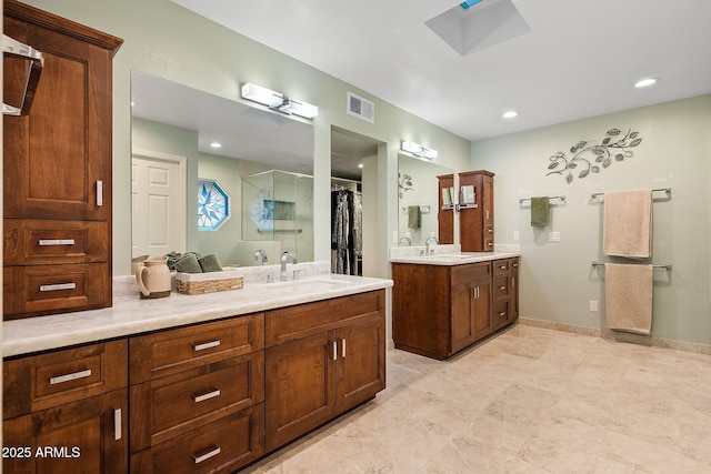 bathroom featuring vanity and walk in shower