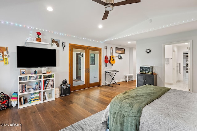 bedroom with ceiling fan, french doors, vaulted ceiling, and hardwood / wood-style flooring