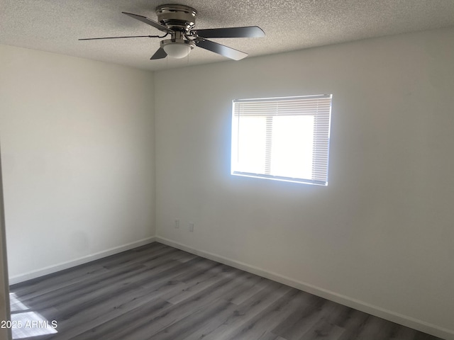 1452 E Emerald Ave, Mesa, AZ 85204 - unfurnished room featuring a textured ceiling, wood finished floors, ceiling fan, and baseboards