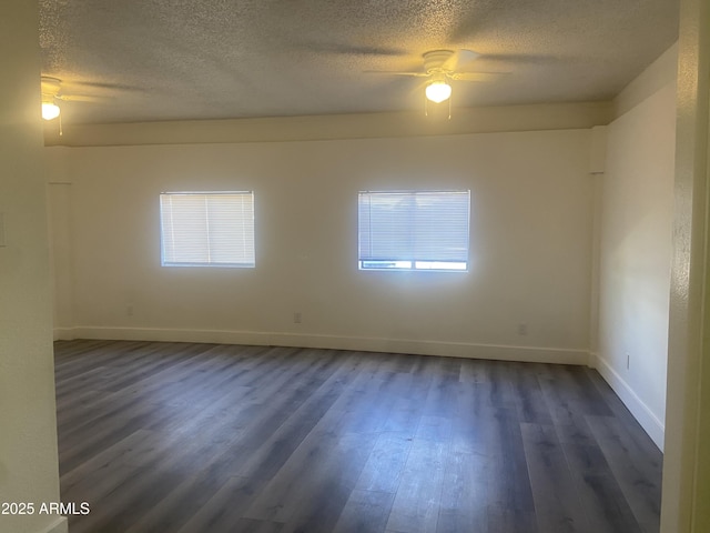 1452 E Emerald Ave, Mesa, AZ 85204 - unfurnished room with a textured ceiling, dark wood-style floors, ceiling fan, and baseboards