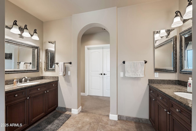 bathroom with vanity and tile patterned floors