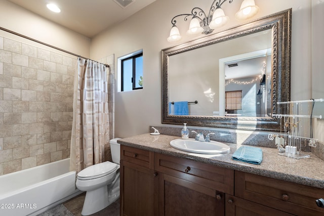 full bathroom with vanity, toilet, and shower / bath combo with shower curtain