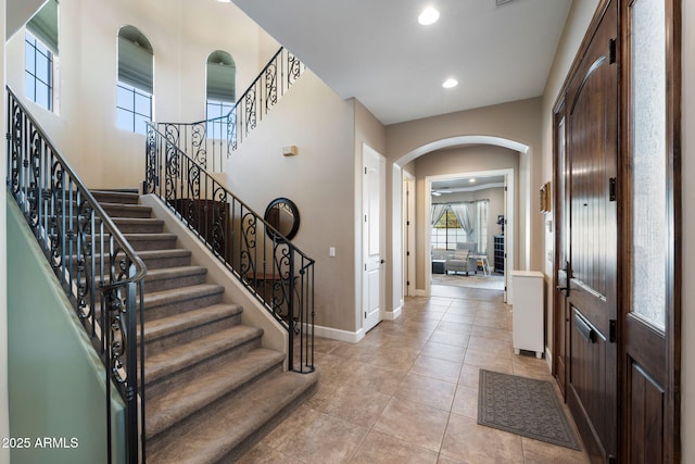 foyer with light tile patterned flooring