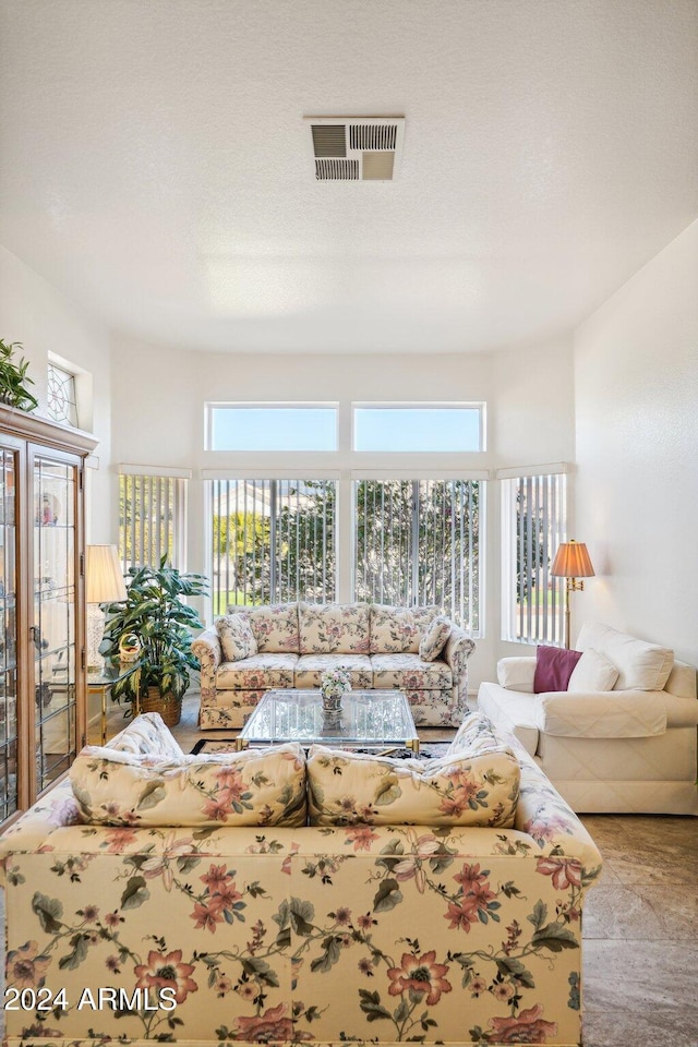 living area featuring visible vents