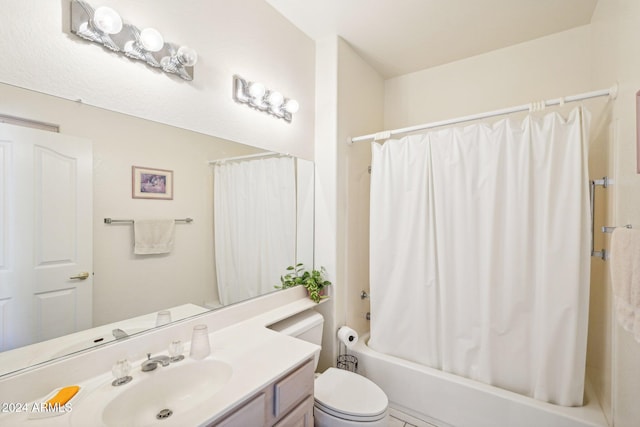 full bath featuring shower / tub combo, vanity, and toilet