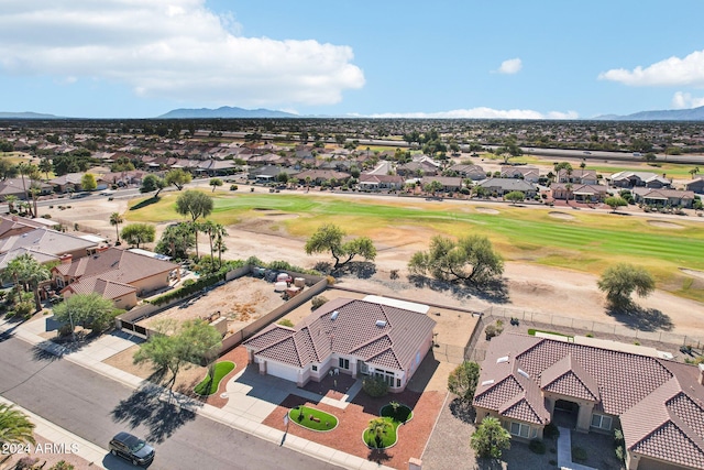 birds eye view of property featuring golf course view, a residential view, and a mountain view