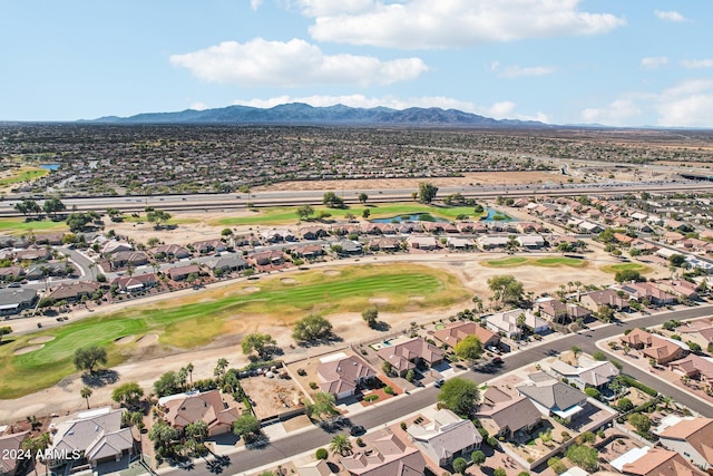 bird's eye view with golf course view, a residential view, and a mountain view