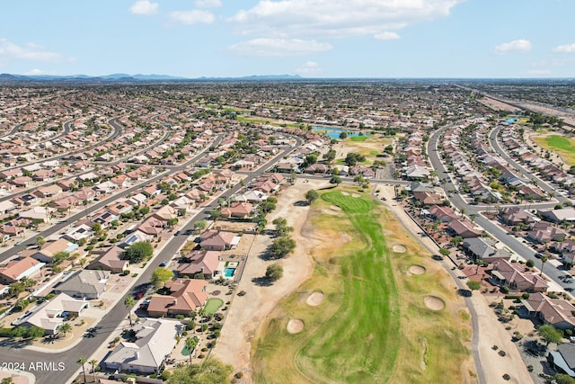 birds eye view of property with a residential view and view of golf course