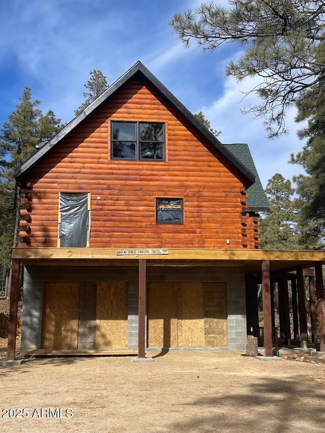 exterior space featuring log siding