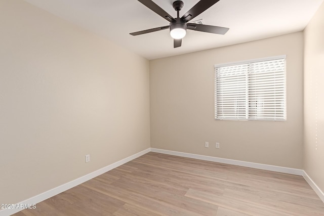 unfurnished room with ceiling fan and light hardwood / wood-style floors