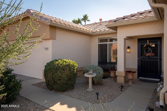 property entrance featuring a garage