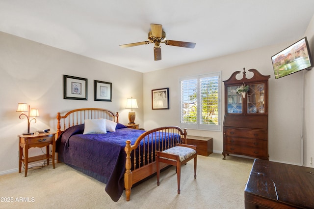 18919 E Reata Ln, Rio Verde, AZ 85263 - bedroom with light carpet, ceiling fan, and baseboards