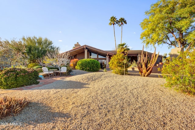 18919 E Reata Ln, Rio Verde, AZ 85263 - view of front of property with a patio area and a chimney