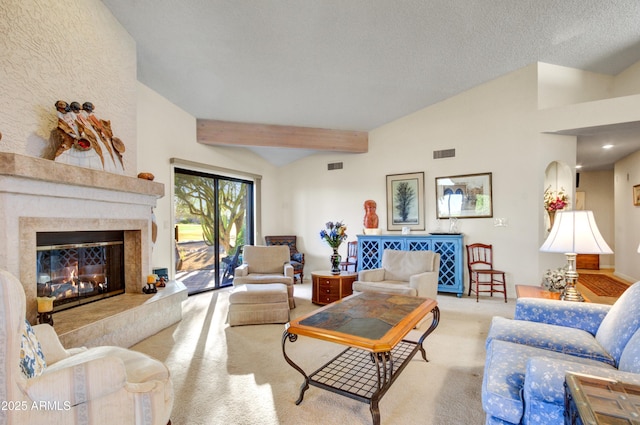 18919 E Reata Ln, Rio Verde, AZ 85263 - living area with a high end fireplace, visible vents, light colored carpet, and lofted ceiling with beams