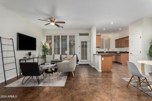 living room with ceiling fan