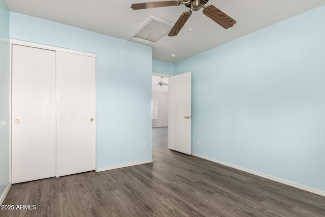 860 N Mcqueen Rd Unit 1157, Chandler, AZ 85225 - unfurnished bedroom with wood finished floors, attic access, a closet, and baseboards