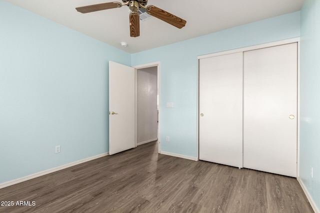 860 N Mcqueen Rd Unit 1157, Chandler, AZ 85225 - unfurnished bedroom with wood finished floors, a closet, baseboards, and ceiling fan