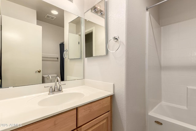 860 N Mcqueen Rd Unit 1157, Chandler, AZ 85225 - bathroom featuring vanity, tub / shower combination, and toilet