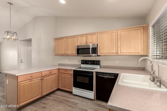 860 N Mcqueen Rd Unit 1157, Chandler, AZ 85225 - kitchen with stainless steel microwave, electric range oven, black dishwasher, light brown cabinetry, and a sink