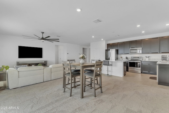 dining area featuring ceiling fan