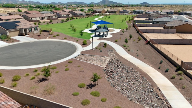 birds eye view of property featuring a mountain view