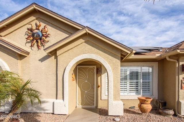 entrance to property with solar panels