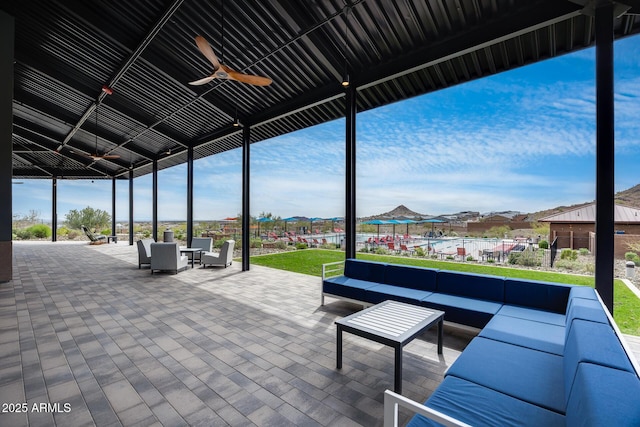 view of patio / terrace featuring outdoor lounge area and a ceiling fan