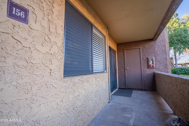 doorway to property featuring a balcony