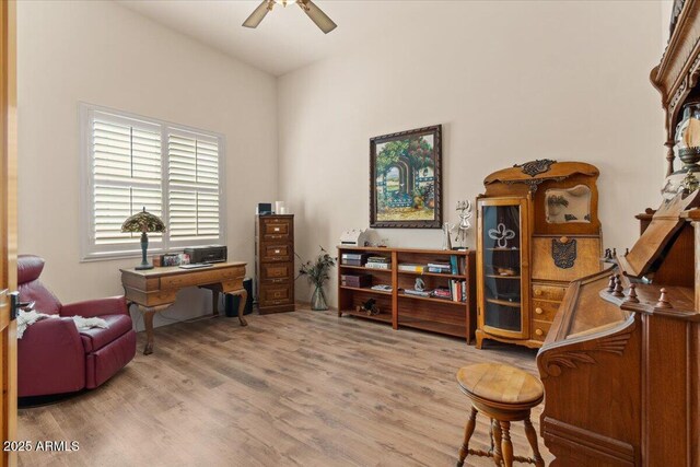 9435 E Hobart Cir, Mesa, AZ 85207 - office area with a ceiling fan and wood finished floors