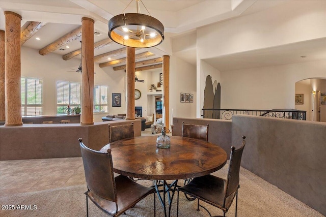 9435 E Hobart Cir, Mesa, AZ 85207 - dining space featuring a ceiling fan, light colored carpet, ornate columns, arched walkways, and recessed lighting
