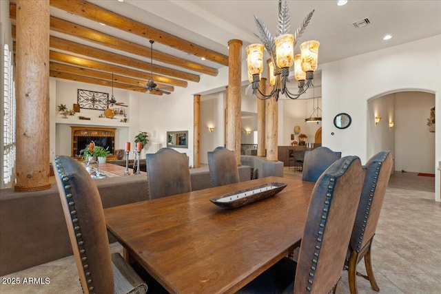 9435 E Hobart Cir, Mesa, AZ 85207 - dining room with arched walkways, a chandelier, recessed lighting, beam ceiling, and ceiling fan