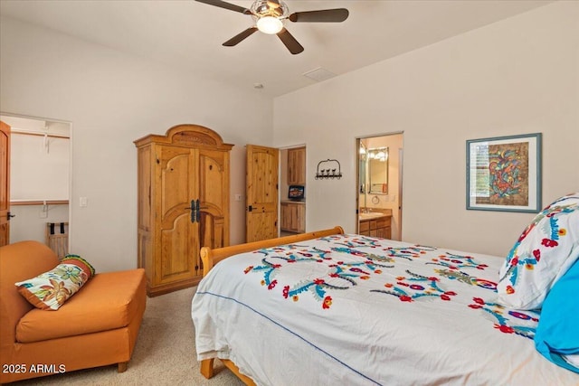 9435 E Hobart Cir, Mesa, AZ 85207 - bedroom with light carpet, high vaulted ceiling, ensuite bath, and a ceiling fan