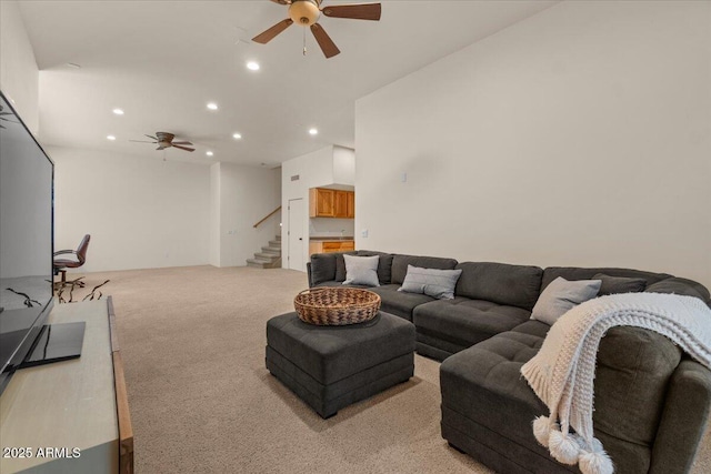 9435 E Hobart Cir, Mesa, AZ 85207 - living area featuring a ceiling fan, recessed lighting, stairway, and light colored carpet