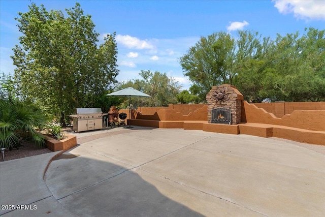 9435 E Hobart Cir, Mesa, AZ 85207 - view of patio / terrace featuring an outdoor stone fireplace and grilling area